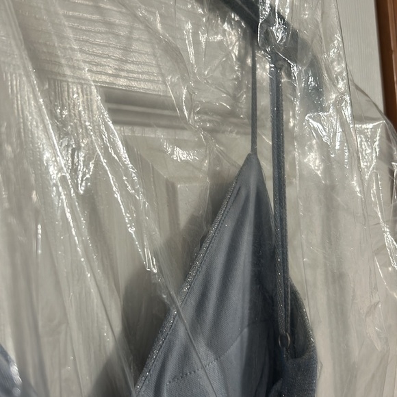 I am selling a sleeveless prom dress that is sparkly blue purplish a size small - Picture 4 of 7